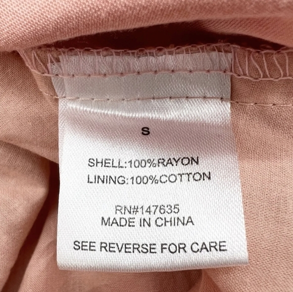 Romeo & Juliet Couture Flutter Sleeve Cut Out Romper in Peach Size Large - Picture 2 of 15